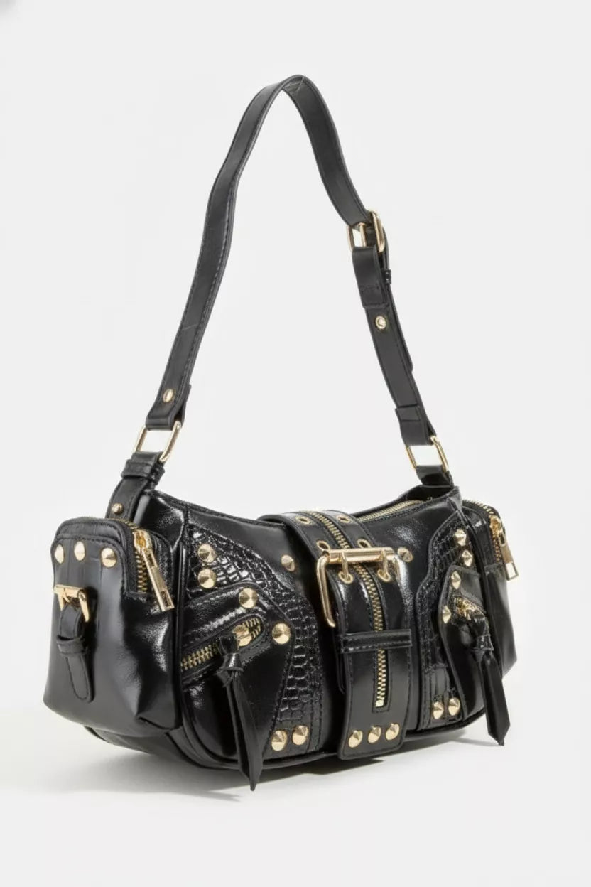 Edgy studded leather handbag side profile