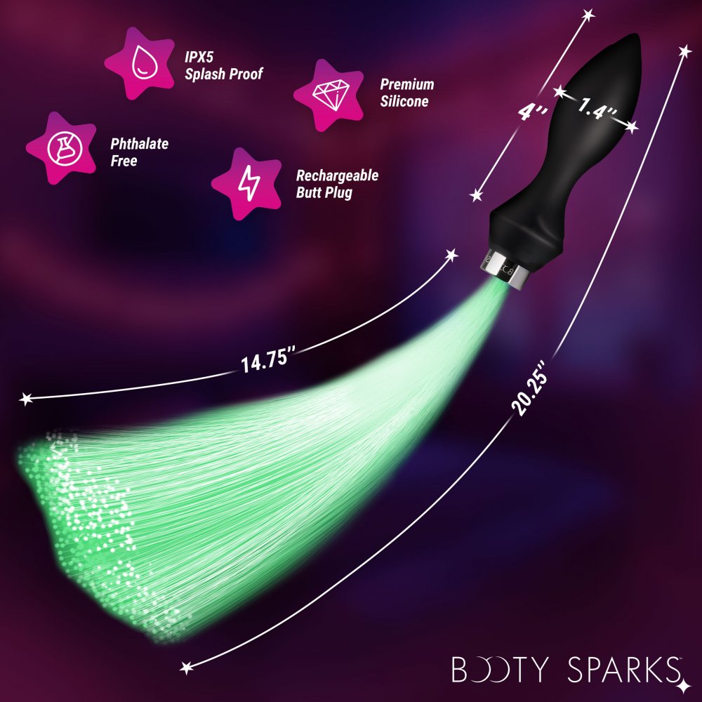 Glowing green butt plug with features and measurements on a dark background, branded 'Booty Sparks'.
