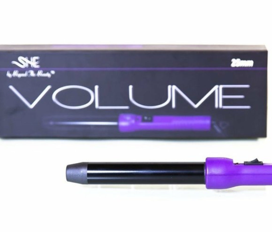 Purple hair styling tool with 'VOLUME' box in the background